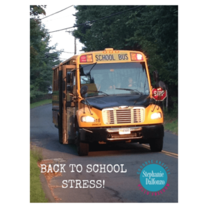 A school bus driving down the road with the words back to school stress.