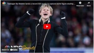 Figure skater celebrates a triumphant performance with a passionate display of emotion on the ice.